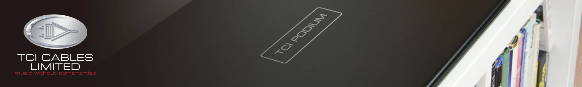 Alt text: "TCI Cables Limited logo and slogan next to a sleek black TCI Podium device on a shelf. The scene conveys a modern and sophisticated tone."