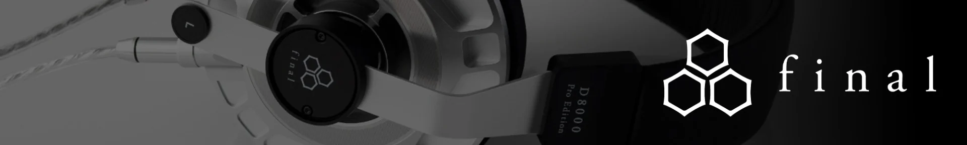 Close-up of stylish Final headphones with metallic components and braided cables. The logo appears prominently, exuding a modern, sleek aesthetic.