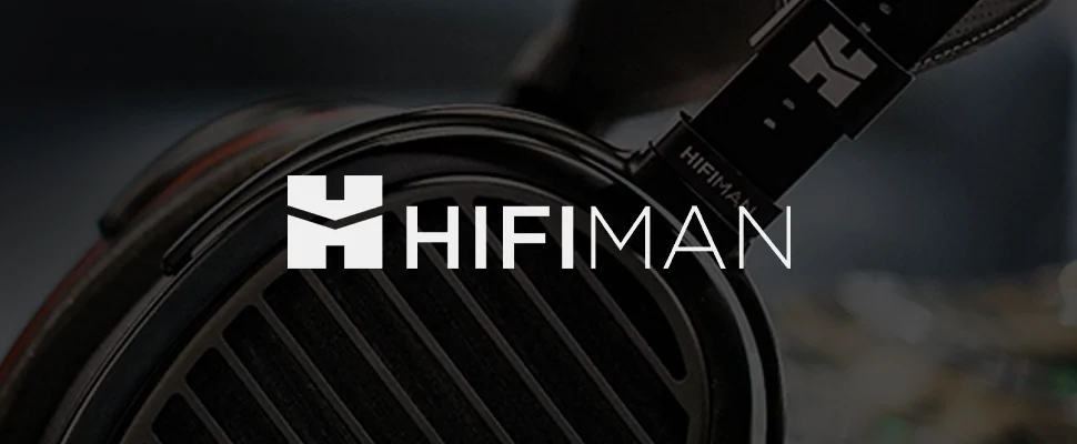 Close-up of a HIFIMAN headphone with sleek black metal and grill design on the right, against a gradient background. The HIFIMAN logo is on the left.