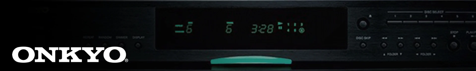 Close-up of an Onkyo audio system with a digital display showing "3:28." It has control buttons and a sleek black design, conveying a modern, sophisticated feel.