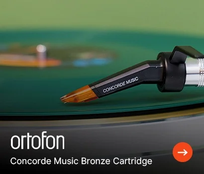 A close-up of a Concorde Music Bronze Cartridge on a green vinyl record. The Ortofon logo and product name appear at the bottom on a black banner.