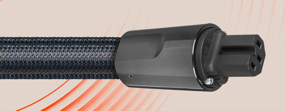 Close-up of a black braided electrical cable with a matte connector on a beige background with curved red lines.