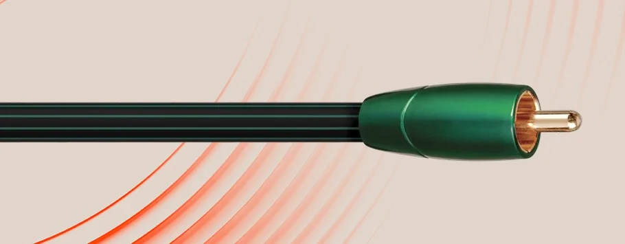 Close-up of a green plug connector with a black cable against a beige and orange radial wave background, conveying a modern tech vibe.
