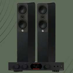 Tall, sleek black speakers with dual drivers, flanking a compact audio amplifier with control knobs on a grey background with subtle wave patterns.