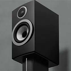 A sleek black speaker with dual drivers is mounted on a stand against a gray background. The design is modern, conveying a sense of high-quality audio equipment.