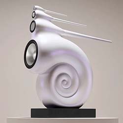 A futuristic speaker design inspired by a snail shell. It features glossy white curves, multiple audio outputs, and stands on a black base, conveying innovation.