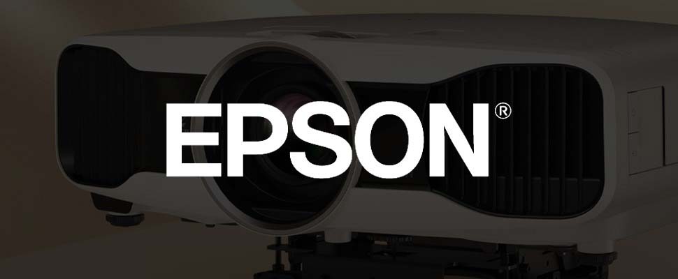A large Epson projector with a sleek, modern design is centered in the image. The brand's name, "EPSON," is prominently displayed over the lens.