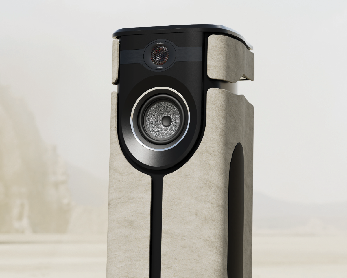 A sleek, modern speaker with a prominent silver woofer and a minimalist design, set against a blurred outdoor background, conveying sophistication.