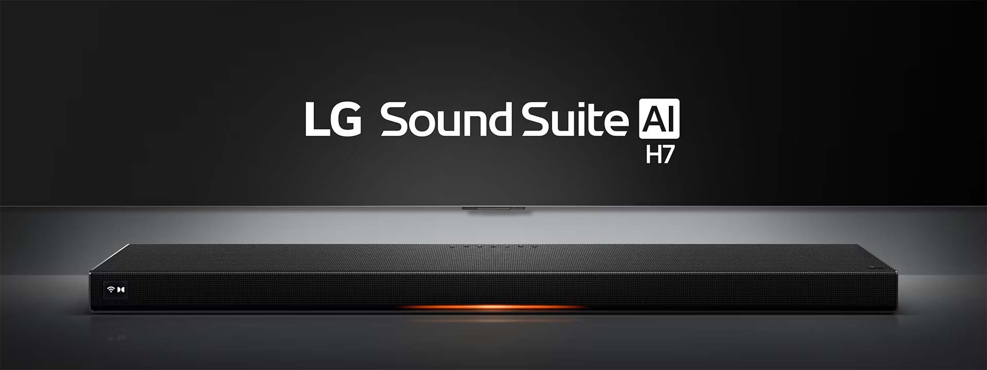 Sleek black LG Sound Suite AI H7 soundbar against a dark background, with subtle orange light beneath, conveys modern and high-tech vibe.