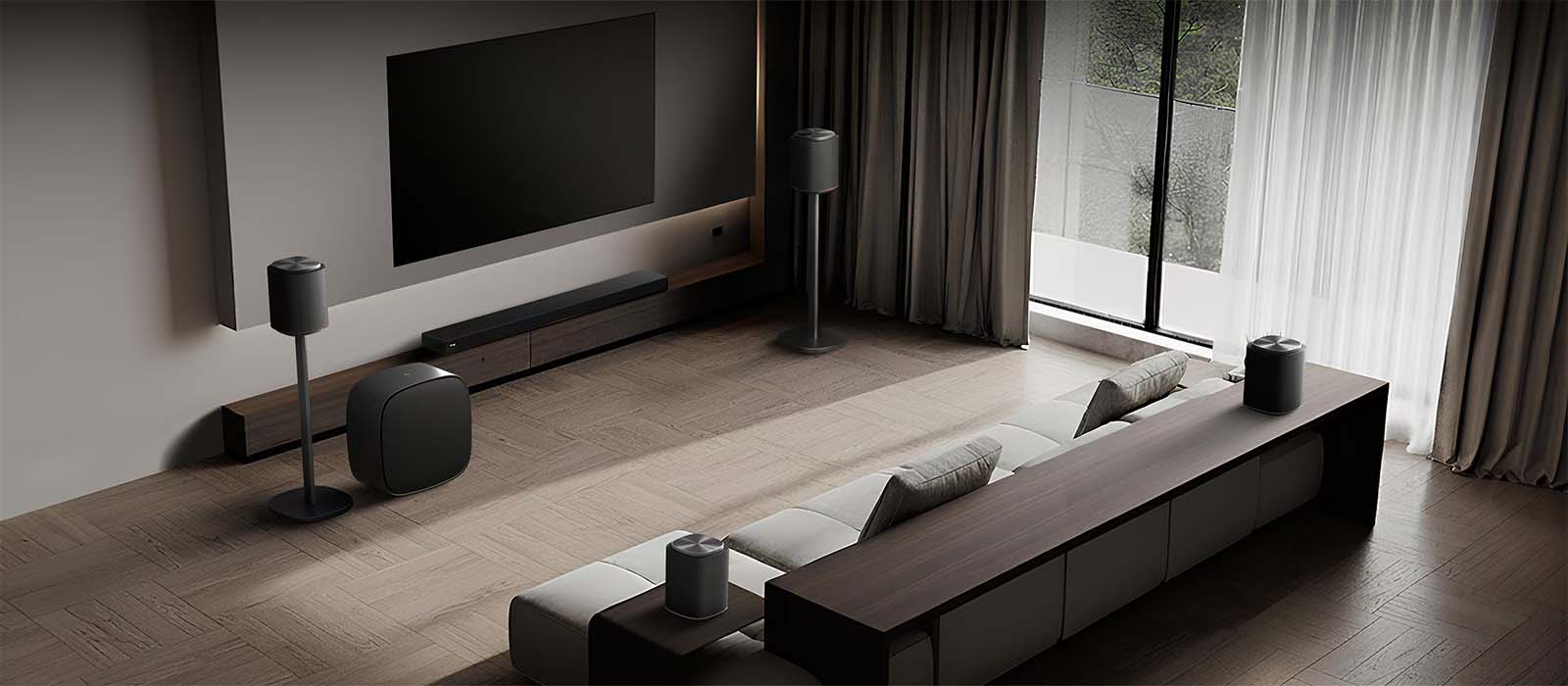 Sleek modern living room with a large wall-mounted TV, minimalist furniture, and elegant floor lamps. Large window draped with curtains. Cozy, sophisticated ambiance.