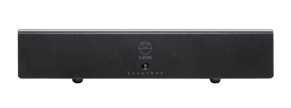A sleek, black Linn power amplifier with a minimalist design is centered on a black background. The Linn logo and an LED are visible on the front panel.