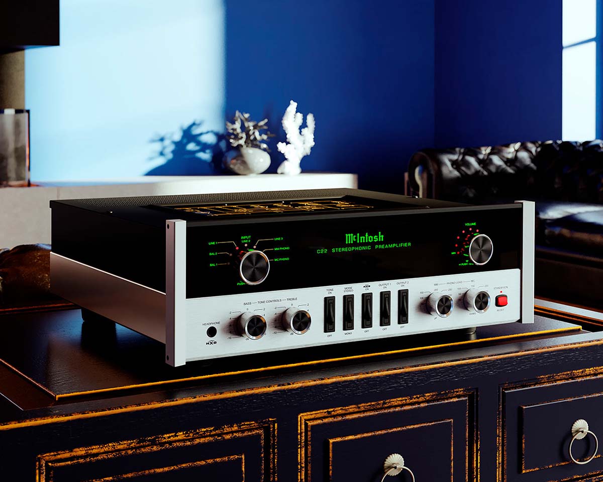 Vintage stereo preamplifier with glowing dials and knobs on a wooden table. Elegant room with moody lighting, blue walls, and decorative objects.