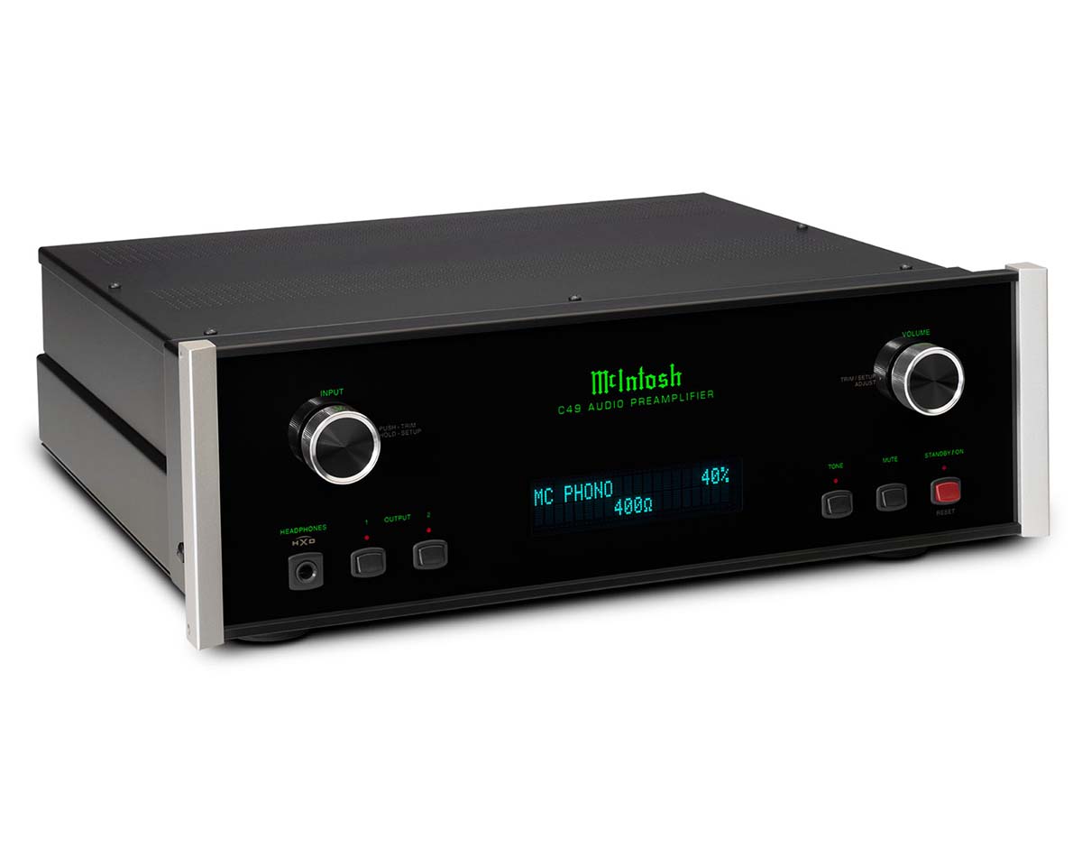 A sleek black audio preamplifier with silver knobs on each side and a digital display showing "MC PHONO 40%." Green text displays the brand name.