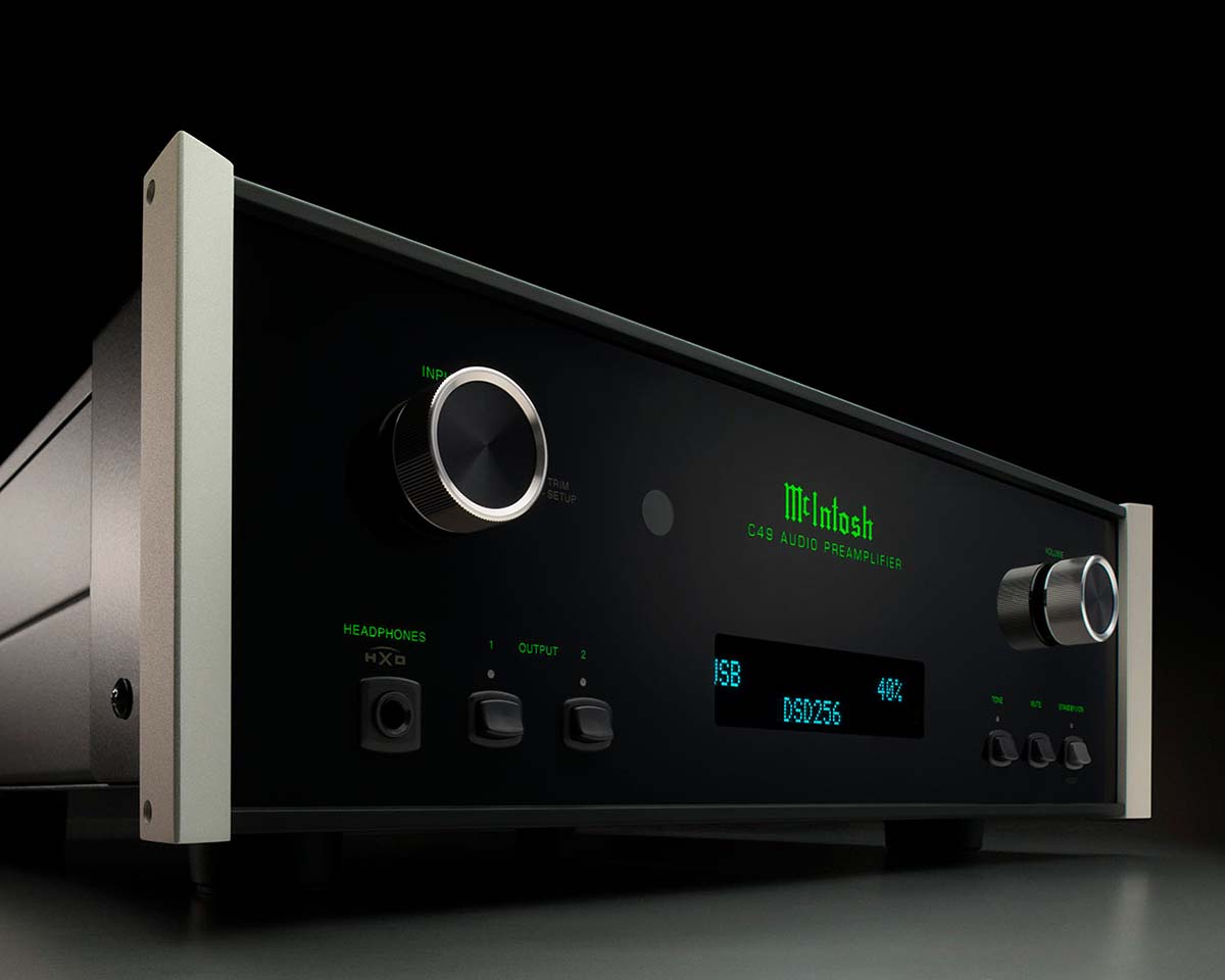 Close-up of a sleek audio preamplifier with a metallic finish, featuring large control knobs, digital display showing "USB" and "DSD256," illuminated in green.