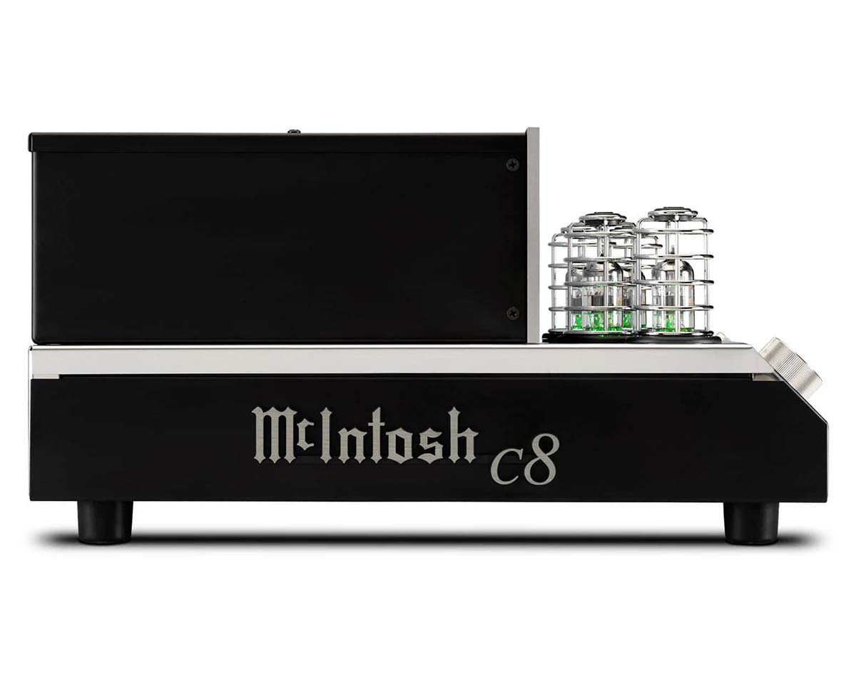 A McIntosh C8 preamplifier, featuring a sleek black design with prominent logo. Two vacuum tubes are visible on the right, enclosed in metal cages.