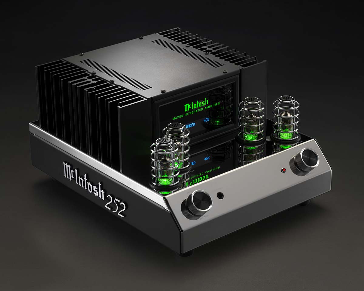A sleek McIntosh 252 amplifier with a modern design, featuring prominent green-lit vacuum tubes and control knobs, set against a dark background.