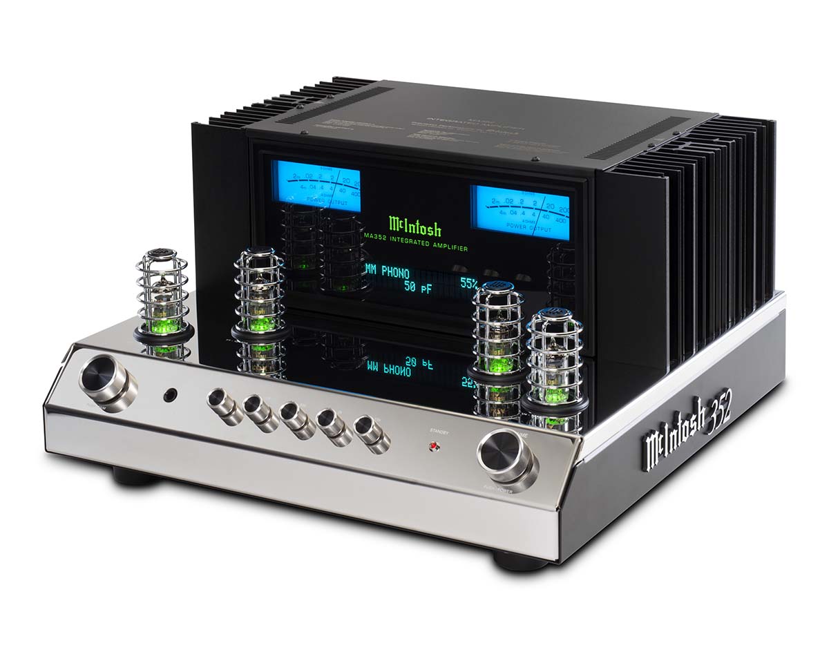 Vintage-style McIntosh audio amplifier with glowing green dials and blue display, evoking a sleek, retro aesthetic and high-end sound quality.