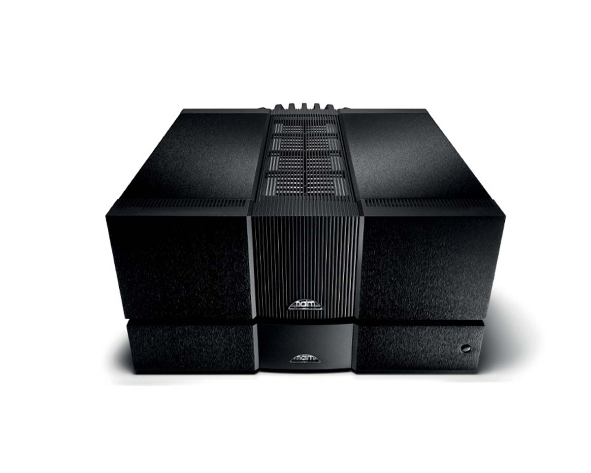 Sleek black box-shaped audio amplifier with textured surface, featuring a central grille for ventilation. It conveys a sense of power and modernity.