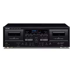 Vintage TEAC dual cassette deck with black finish and various control buttons. Displays digital screen and cassette slots, evoking a nostalgic audio era.
