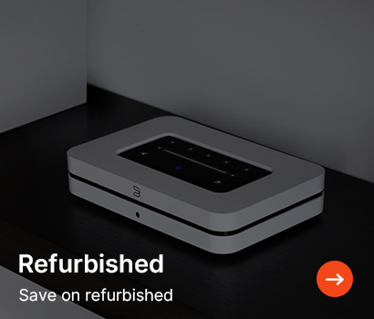A sleek, rectangular electronic device with a digital display sits on a dark surface. Text reads, "Refurbished: Save on refurbished." An orange arrow is seen.