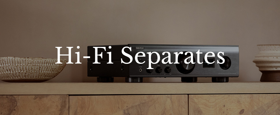 A sleek black hi-fi stereo system on a wooden cabinet between two textured ceramic bowls. The text "Hi-Fi Separates" overlays the image.