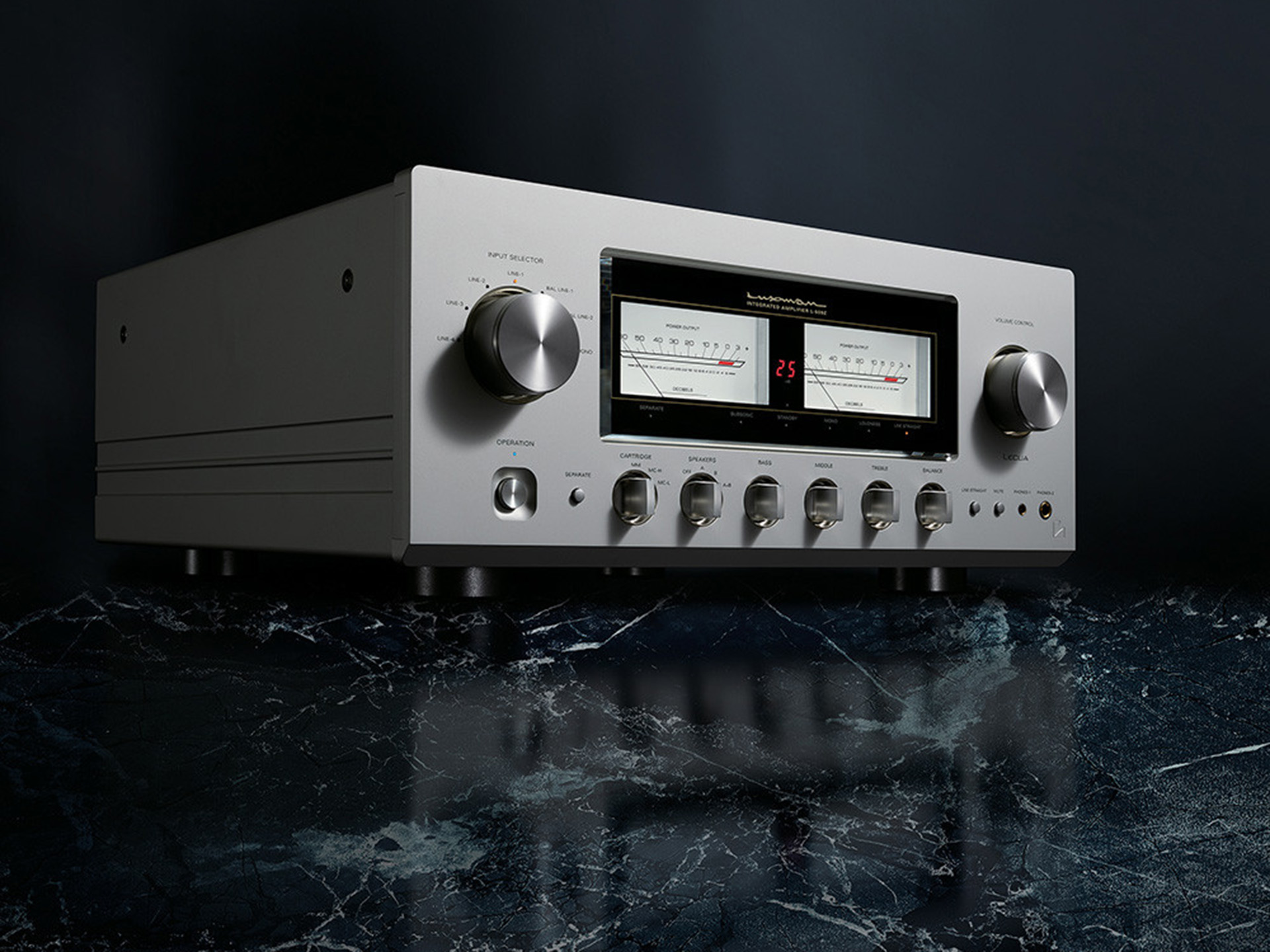 Vintage silver audio amplifier with large knobs and dual needle VU meters on a glossy, dark marble surface, creating a sleek, retro vibe.