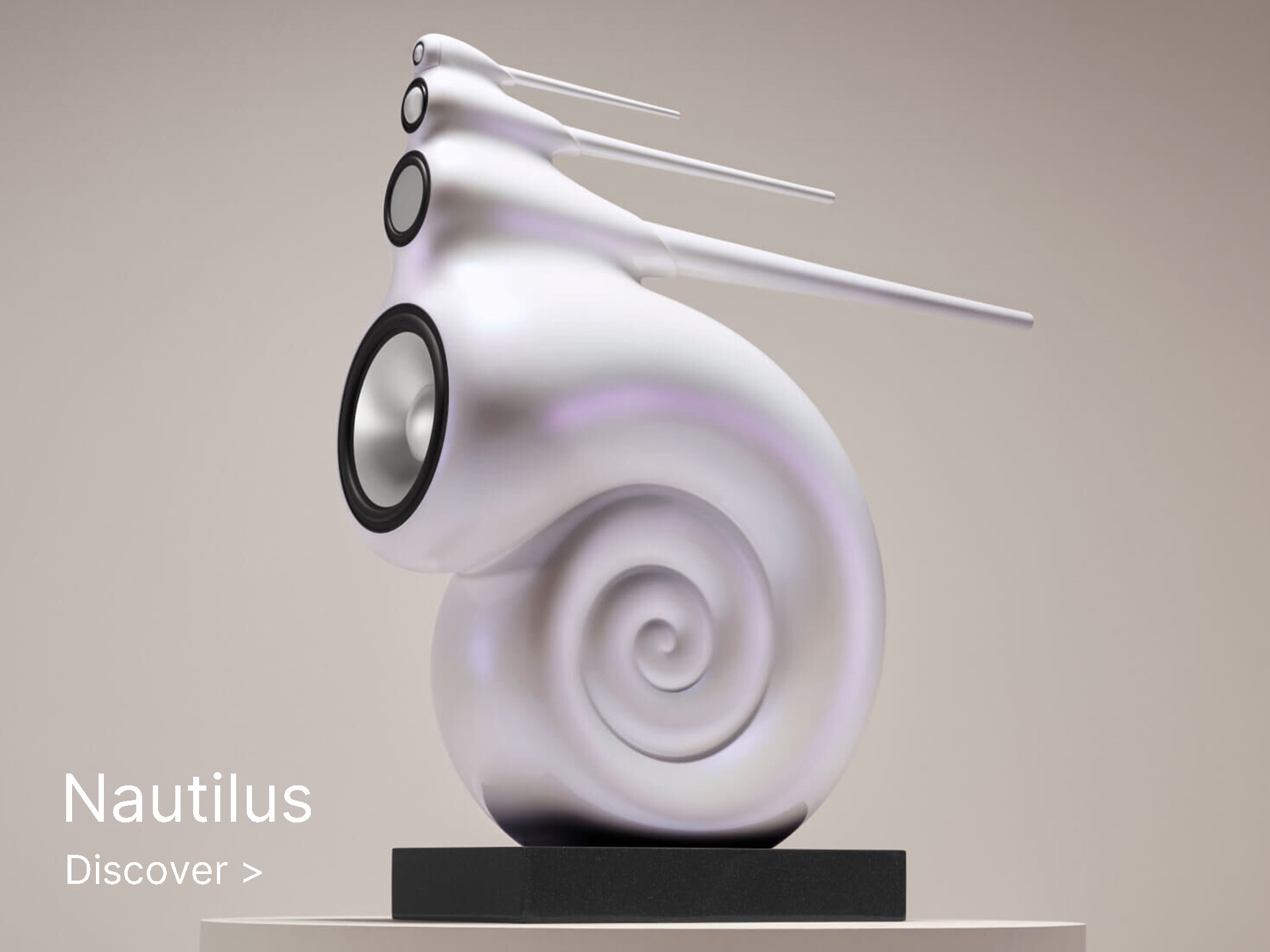 Spiral-shaped white speaker with sleek, futuristic design, resembling a nautilus shell. The text reads "Nautilus Bowers & Wilkins." Modern and artistic.