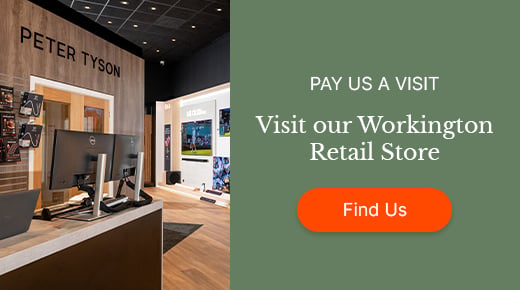 Store interior with modern tech displays and "Peter Tyson" signage on a wooden wall. Text reads, "Visit our Workington Retail Store" beside an orange "Find Us" button.