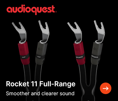AudioQuest promotional banner for the Rocket 11 speaker cable featuring the headline "Rocket 11 Full-Range" and subtext "Smoother and clearer sound". The banner displays two sets of high-fidelity speaker cable terminations against a solid black background, showcasing silver spade connectors. The cable ends on the left are marked with red and grey boots labeled "AMP", while the cable ends on the right feature red and grey boots labeled "SPEAKER". The red AudioQuest logo is placed at the top-left corner, and a bright orange circular action button with a white right-pointing arrow is at the bottom right.