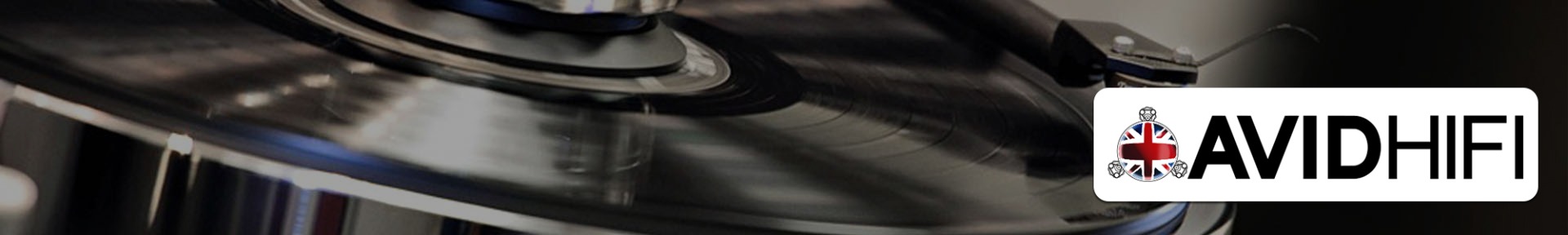 Close-up of a spinning record on a turntable with a stylus, set against a dark background. The AVIDHIFI logo appears on the right, featuring a British flag emblem.