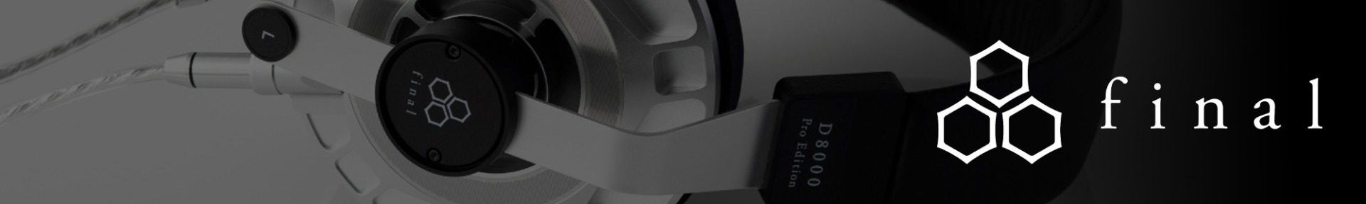 Close-up of stylish Final headphones with metallic components and braided cables. The logo appears prominently, exuding a modern, sleek aesthetic.