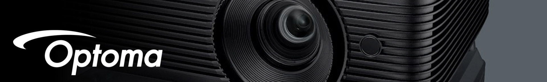 Close-up of a black Optoma projector lens with concentric ridges, conveying a sleek and modern design. The Optoma logo is prominently displayed.