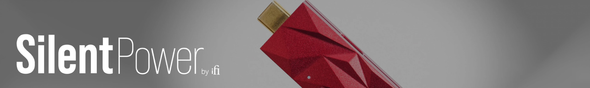 Grey background with bold white text "Silent Power by ifi." A red, geometric USB device is angled to the right, adding a sleek, modern feel.