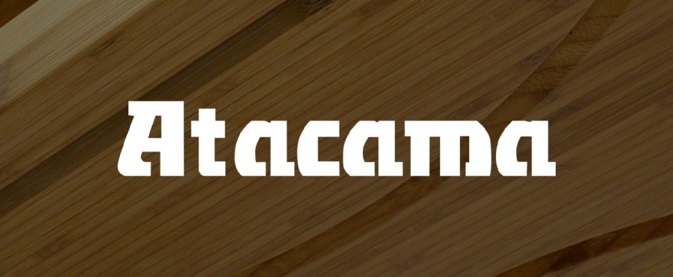 Text "Atacama" in bold, white, stylized font overlays a background of light brown, diagonal wooden planks, creating a modern and earthy feel.