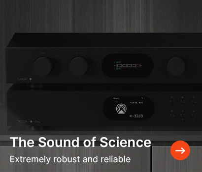 Two sleek black audio components in a dimly lit setting. Text reads "The Sound of Science. Extremely robust and reliable." A red arrow icon is visible.