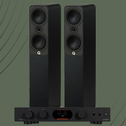 Tall black floor-standing speakers with circular elements, paired with a sleek black audio amplifier. Background features subtle, curved lines.