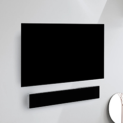 Wall-mounted flat-screen TV and soundbar on a light gray wall. Sleek, modern design conveys a minimalist and tech-savvy ambiance. Mirror edge visible.