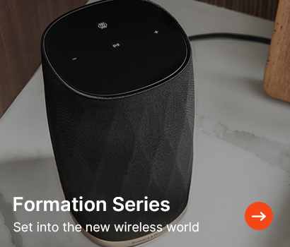 A sleek wireless speaker on a marble surface. Text reads "Formation Series: Set into the new wireless world," conveying innovation and modernity.