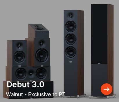 Set of walnut-finished speakers, including a tall floor-standing model and shorter stacked units, on a grey background. Text: 'Debut 3.0, Walnut - Exclusive to PT' with an orange arrow.
