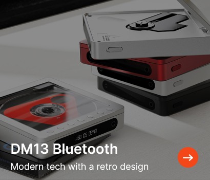 Stacked DM13 Bluetooth devices featuring a retro design with CD player aesthetics and modern controls.