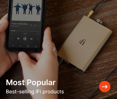 Hands holding a smartphone playing a song, next to an iFi audio device on a wooden table. Text reads "Most Popular: Best-selling iFi products."