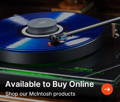 A blue vinyl record playing on a McIntosh turntable. Text reads: "Available to Buy Online. Shop our McIntosh products." An arrow icon is displayed.
