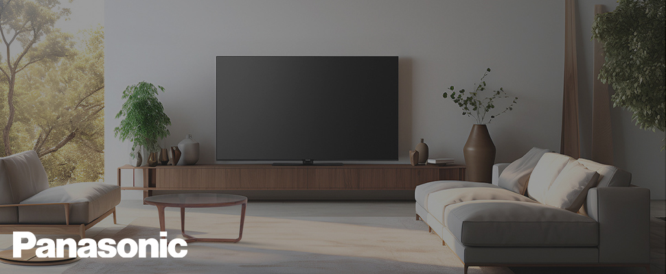 A sleek Panasonic TV on a wooden stand in a modern living room with plants, soft cushions, and natural light, creating a calm and inviting atmosphere.