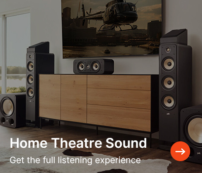 Home theatre setup with large speakers flanking a wooden cabinet, TV above. Text reads "Home Theatre Sound: Get the full listening experience."