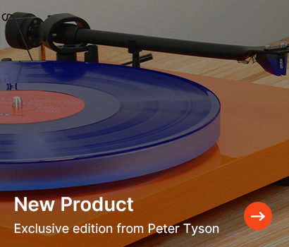 A blue vinyl record on an orange turntable, with text overlay: "New Product. Exclusive edition from Peter Tyson." A red arrow indicates more info.