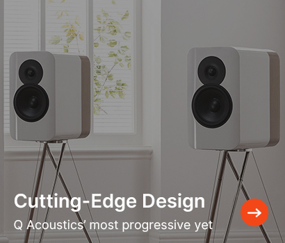 Modern white speakers with dual drivers on stands in a minimalist room. Text reads, "Cutting-Edge Design: Q Acoustics' most progressive yet."