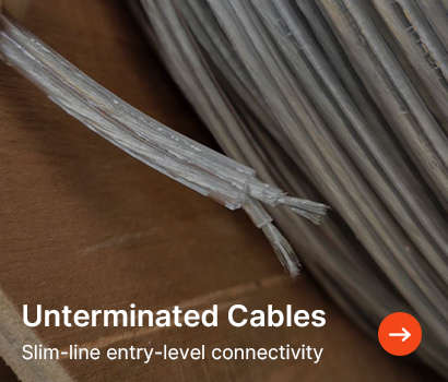 Coiled grey cables on brown cardboard, labelled "Unterminated Cables: Slim-line entry-level connectivity" with an orange arrow icon.
