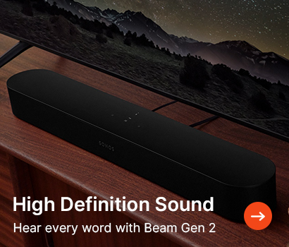 Black soundbar on a wooden TV stand with a mountain landscape on the screen. Text: "High Definition Sound. Hear every word with Beam Gen 2."