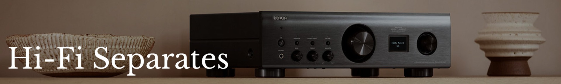 Close-up of an Epson projector lens with the brand's logo visible on the right. The image highlights the sleek design and advanced technology.