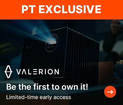 "Advertisement for Valerion projector, labelled 'PT Exclusive,' on an orange banner. The projector emits light in a dimly lit room, promoting limited-time early access."